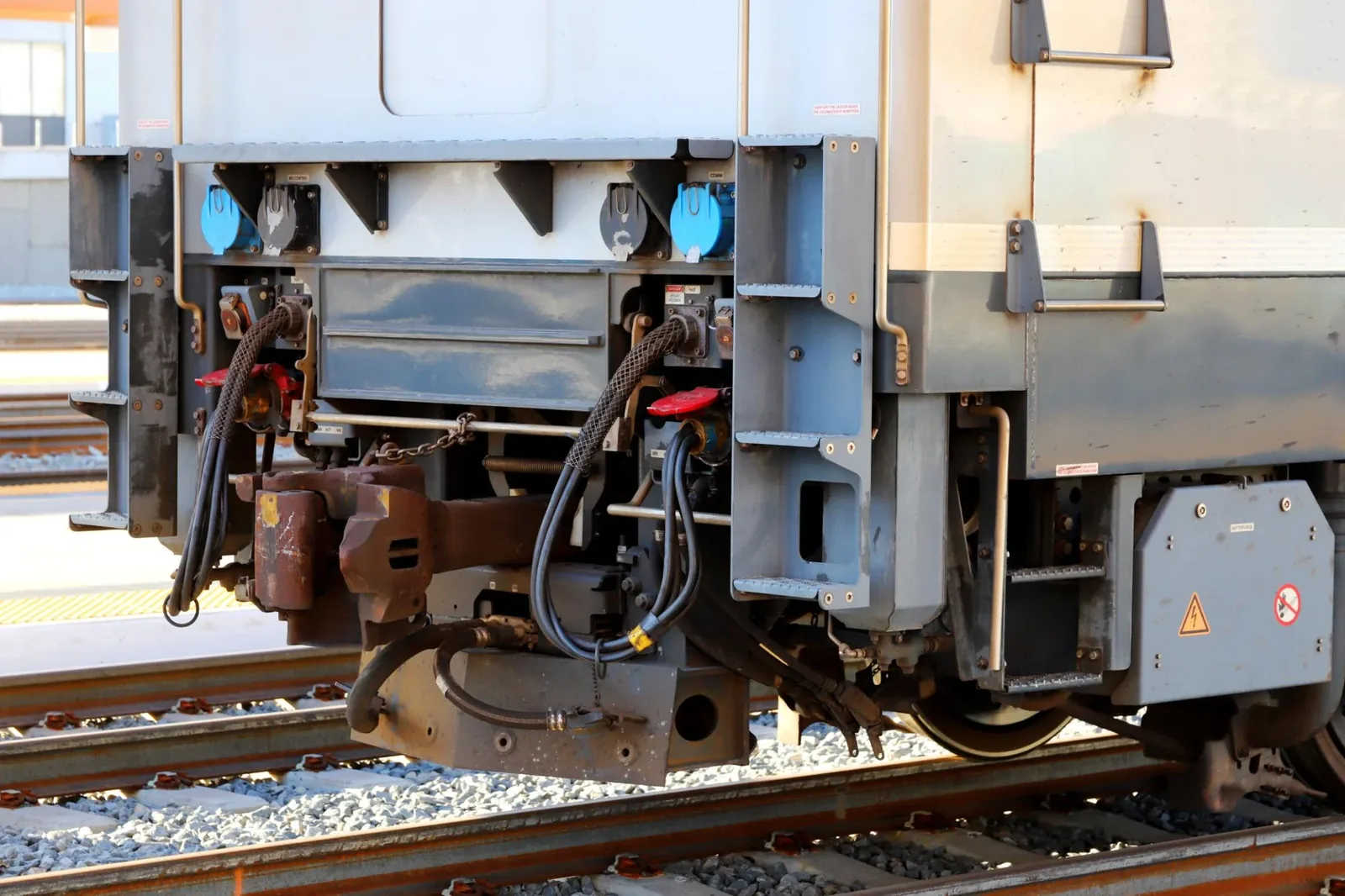 Illustrative locomotive undercarriage and cable-routing environment