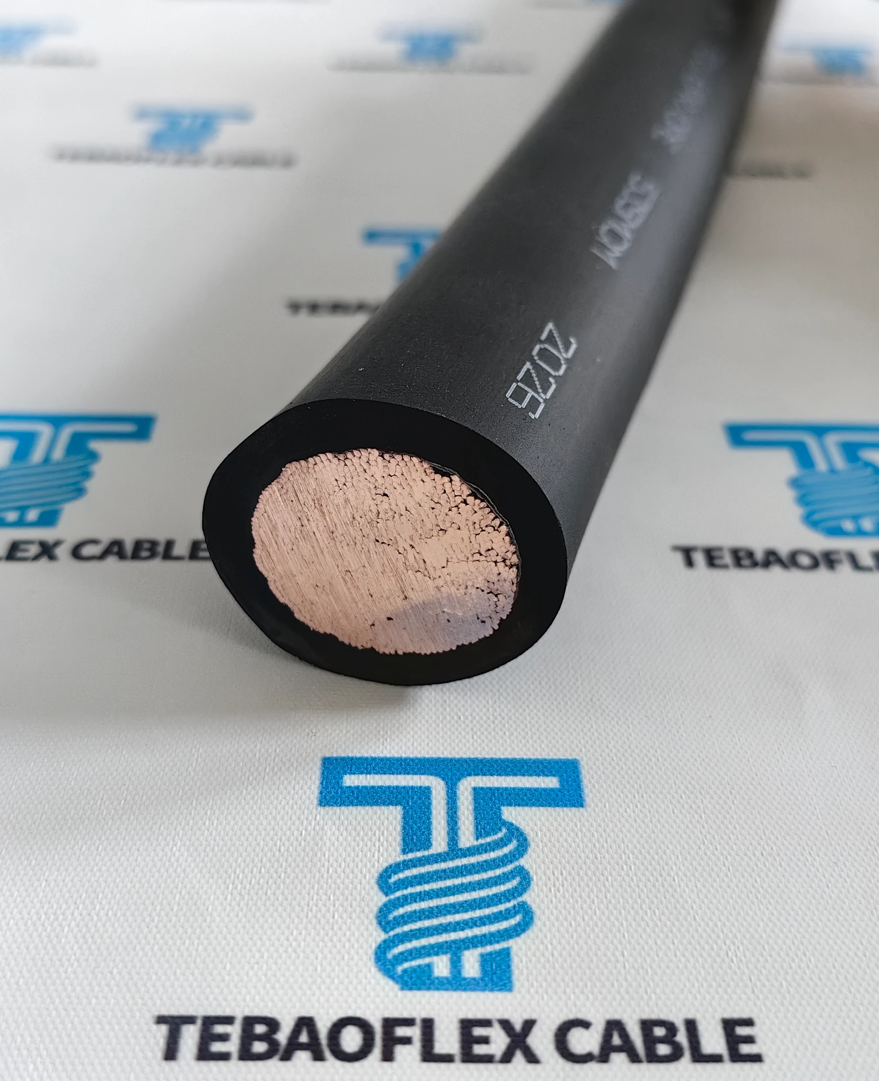 Close-up of a cable conductor and jacket marking used as an illustrative technical editorial visual